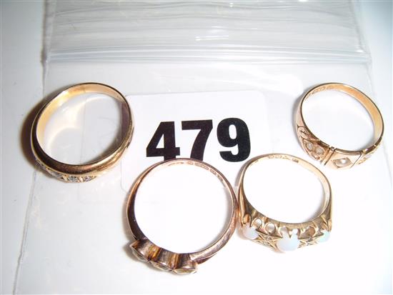 Four gem set gold rings